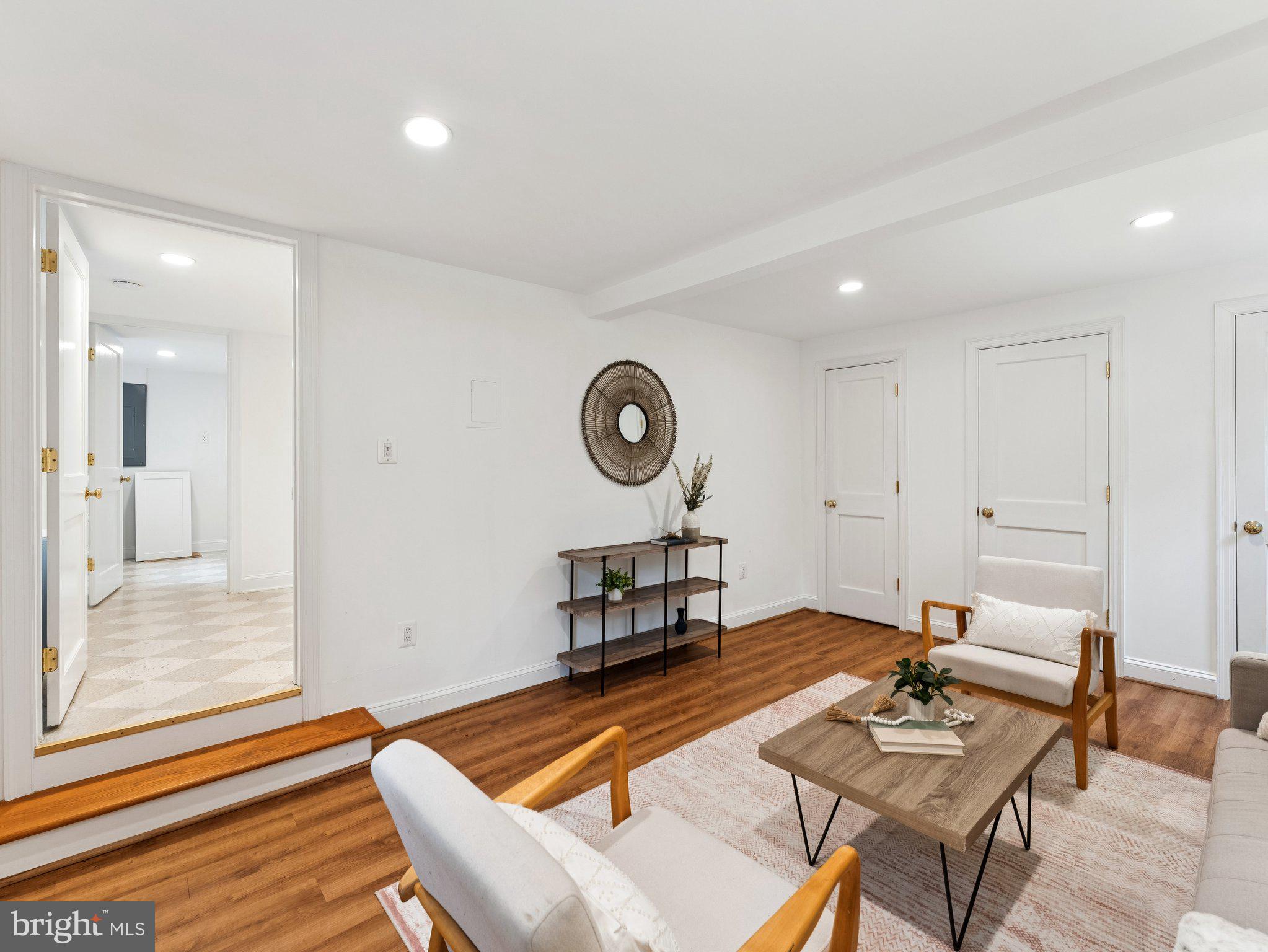3541 R Street Northwest Washington, DC 20007 - Photo 28 of 35 a living room with furniture a rug and a window