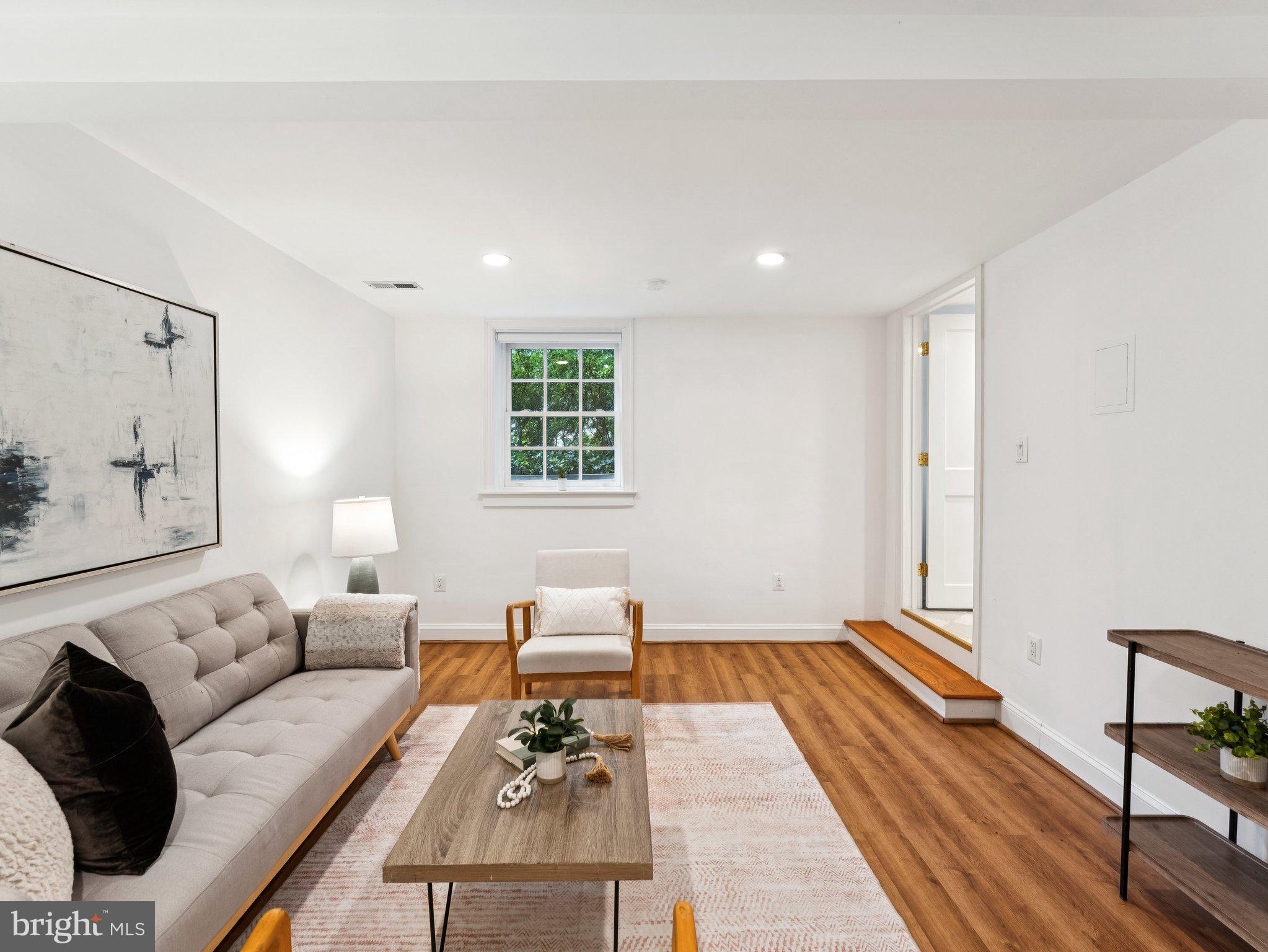3541 R Street Northwest Washington, DC 20007 - Photo 29 of 35 a living room with furniture and wooden floor