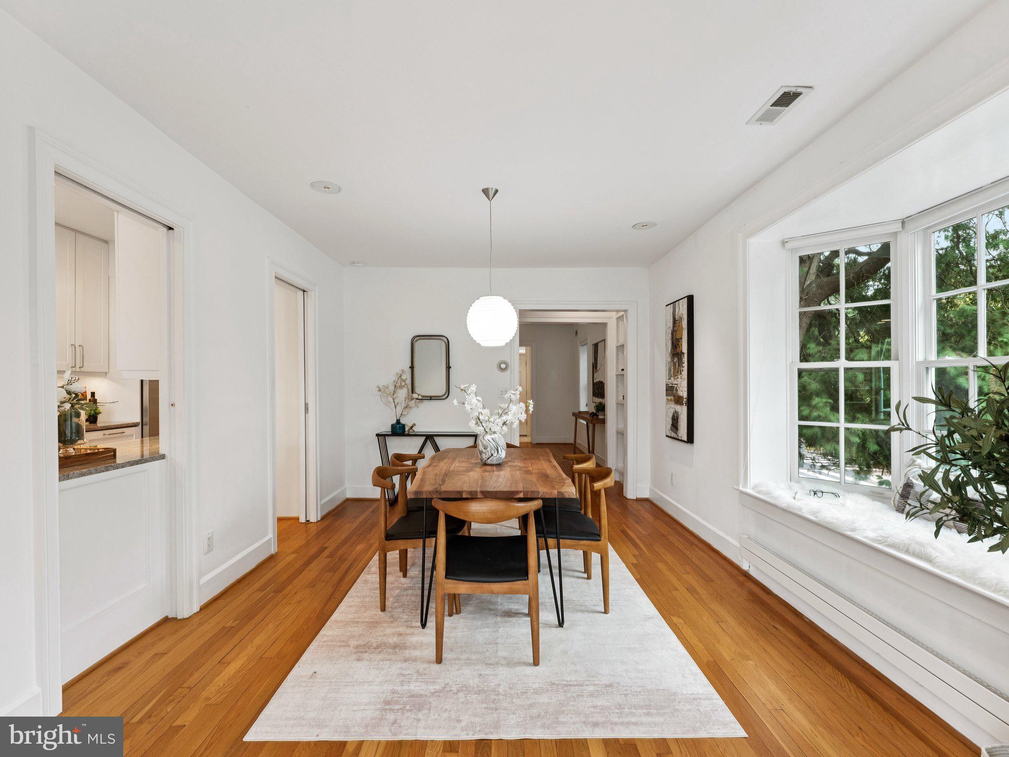 3541 R Street Northwest Washington, DC 20007 - Photo 7 of 35 a living room with furniture fireplace and a large window