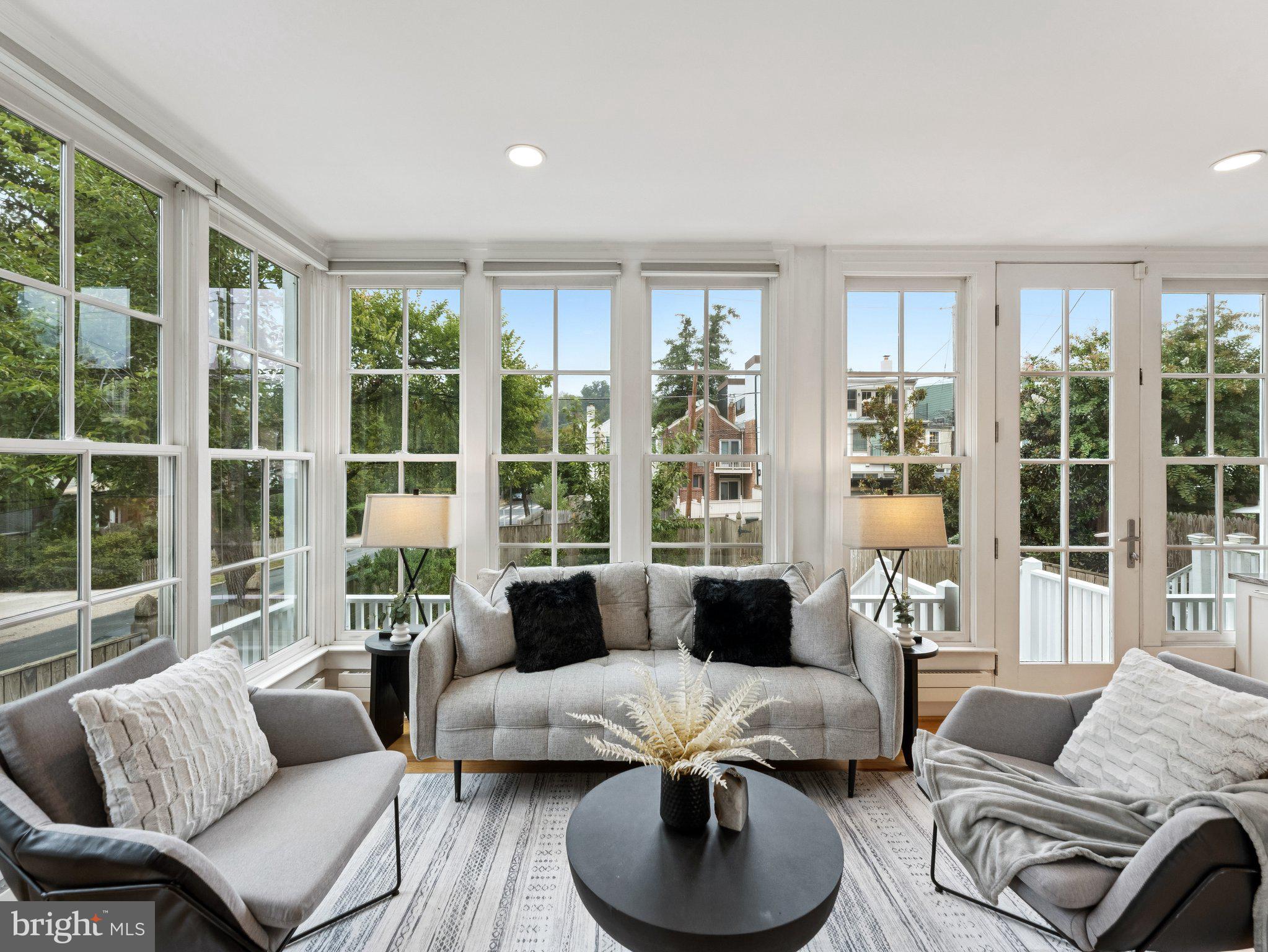 3541 R Street Northwest Washington, DC 20007 - Photo 8 of 35 a living room with furniture and a large window