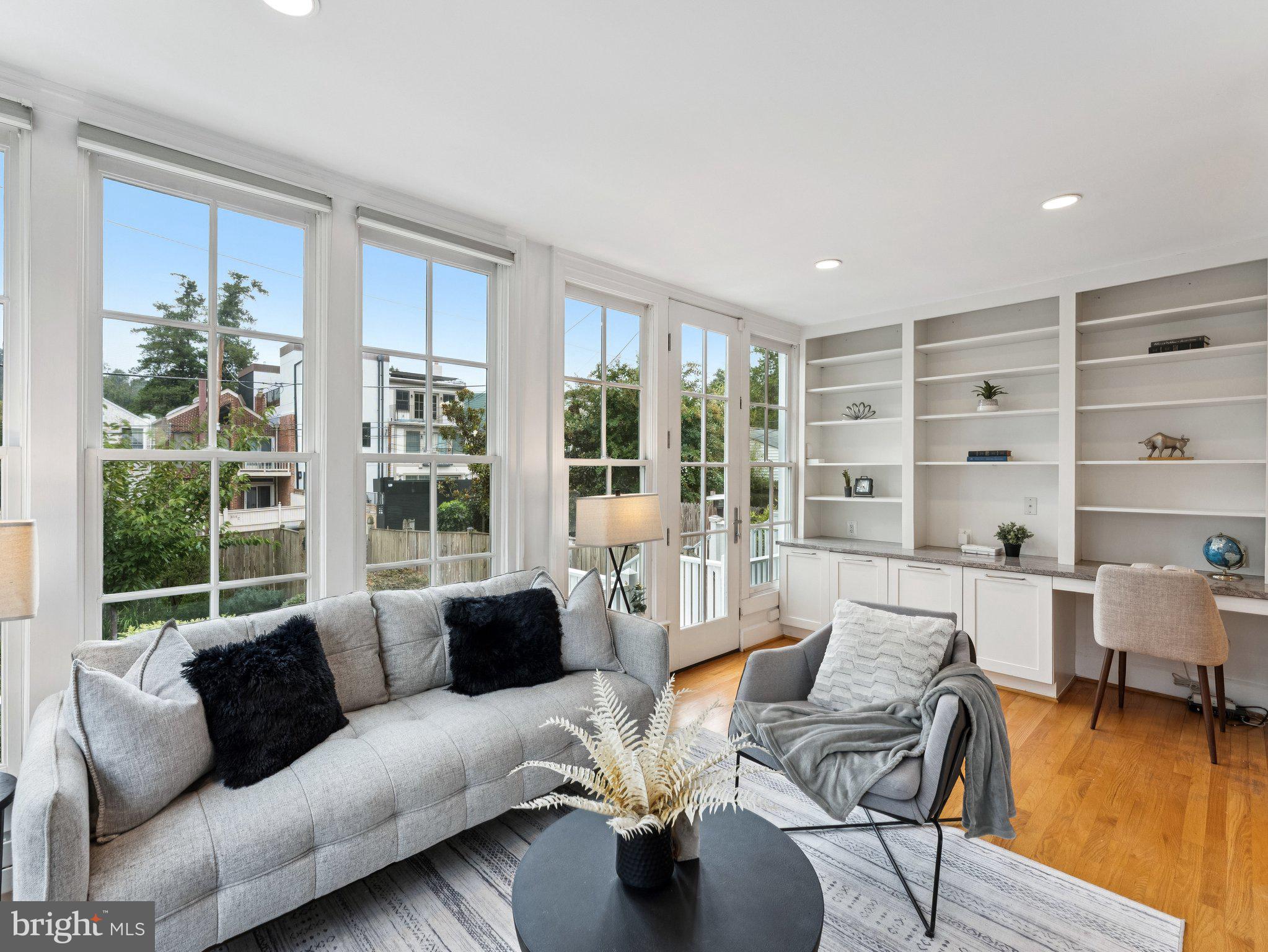 3541 R Street Northwest Washington, DC 20007 - Photo 9 of 35 a living room with furniture and a large window