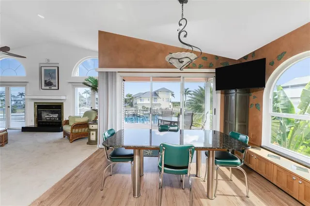 a view of a balcony with wooden floor