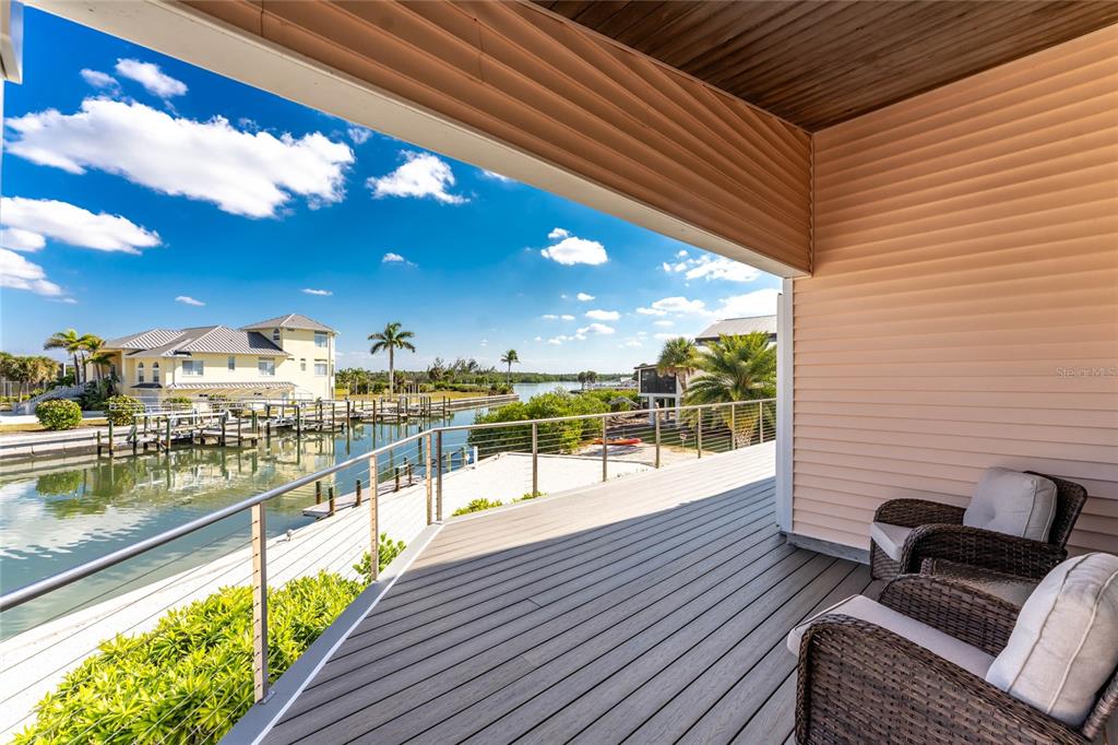 2805 North Beach Road, Unit B Englewood, FL 34223 - Photo 27 of 86 a view of a balcony with wooden floor