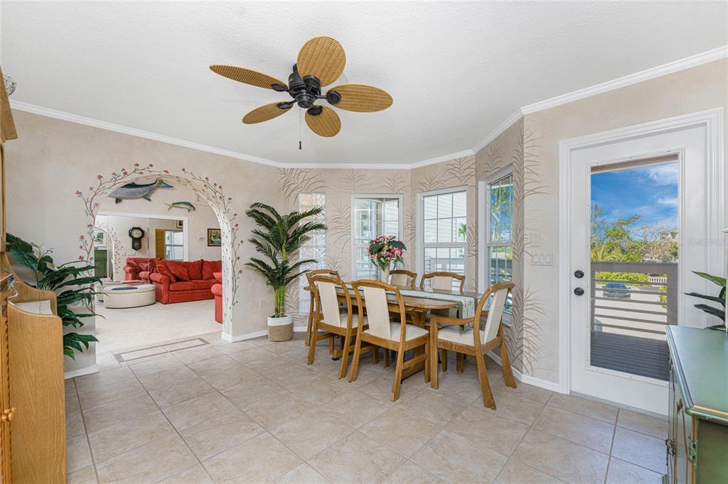 2805 North Beach Road, Unit B Englewood, FL 34223 - Photo 35 of 86 a view of a livingroom with furniture and a ceiling fan