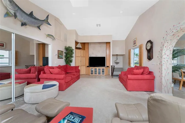 a view of a house with deck and wooden floor