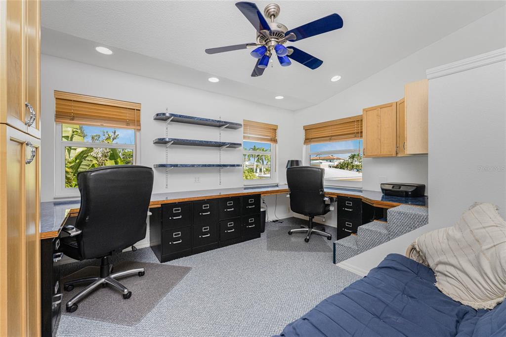 2805 North Beach Road, Unit B Englewood, FL 34223 - Photo 39 of 86 a view of a workspace with furniture and a window