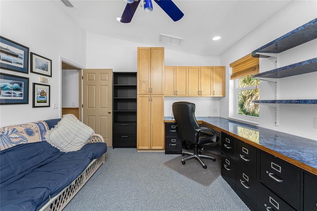 2805 North Beach Road, Unit B Englewood, FL 34223 - Photo 40 of 86 a bedroom with furniture and a window