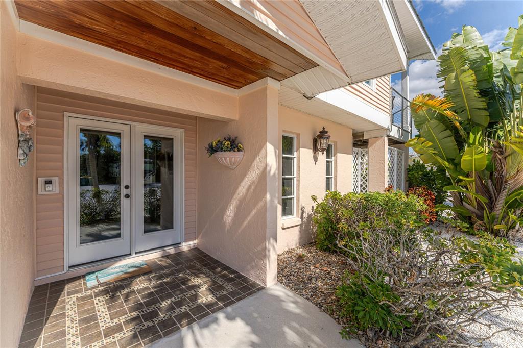 2805 North Beach Road, Unit B Englewood, FL 34223 - Photo 7 of 86 a view of a entryway door of the house