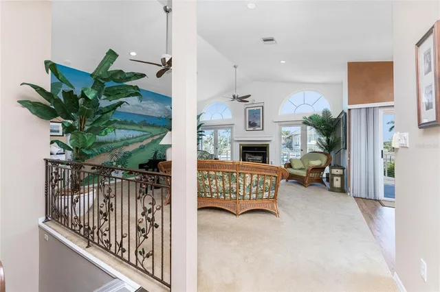 a living room with furniture fireplace and a fireplace