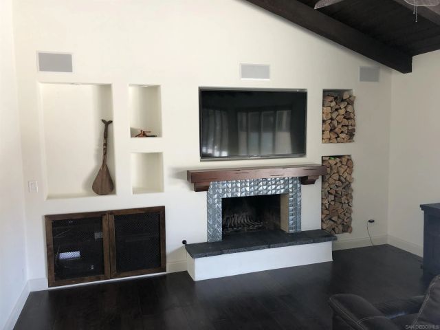 a bedroom with a bed and furniture