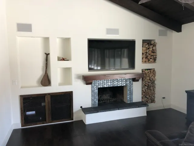 a bedroom with a bed and furniture