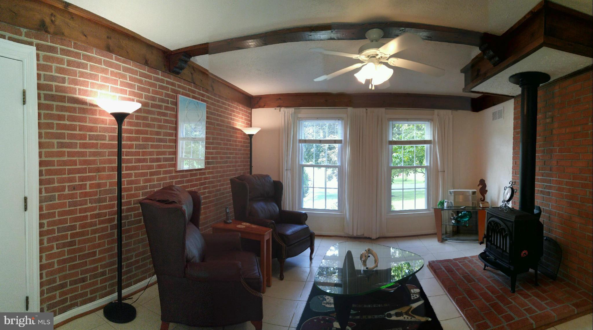 11631 Rivershore Drive Dunkirk, MD 20754 - Photo 14 of 27 Family Room with Woodstove