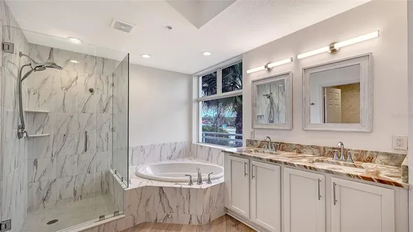 a view of a lake with a bench in front of it