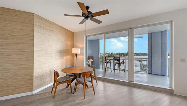 a view of swimming pool from a balcony