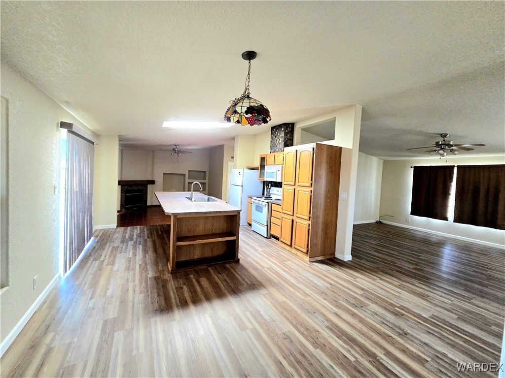 4149 Carrizo Road Golden Valley, AZ 86413 - Photo 16 of 47 a living room with furniture and a wooden floor