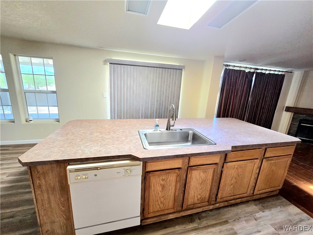 4149 Carrizo Road Golden Valley, AZ 86413 - Photo 19 of 47 a room with a sink a cabinets and wooden floor