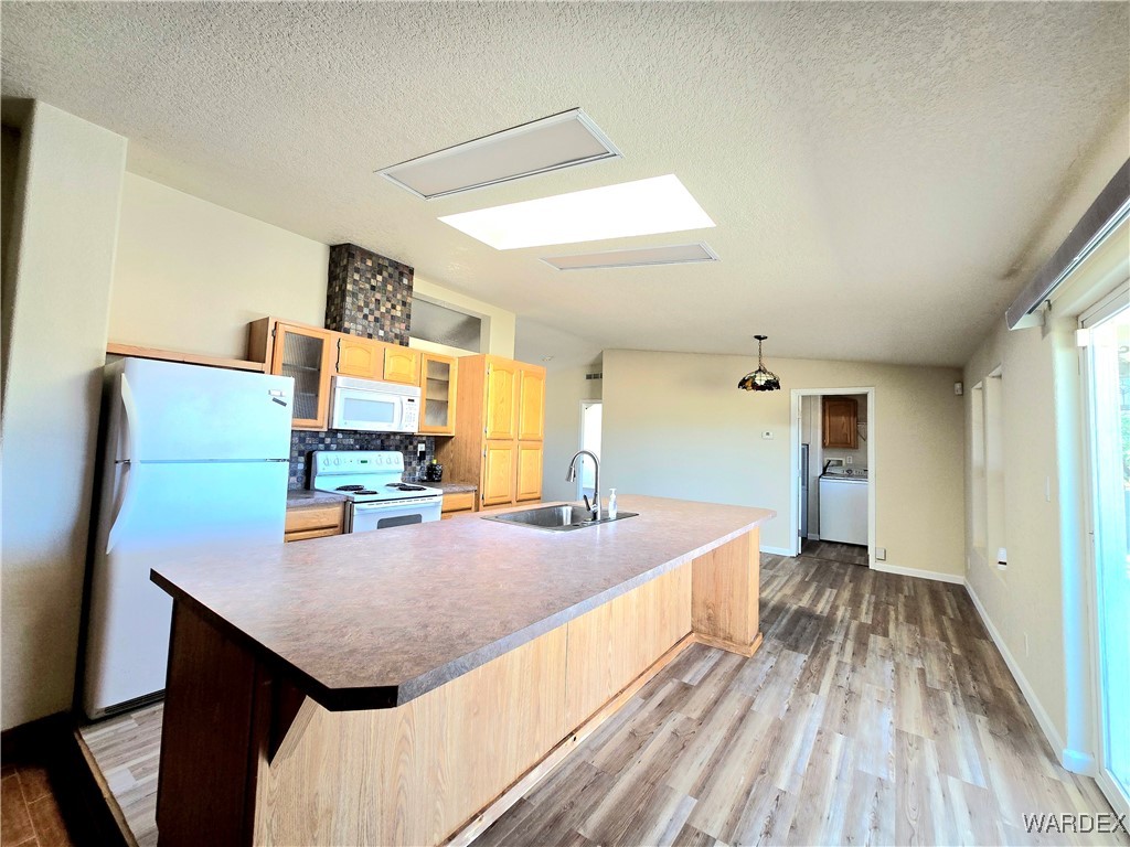 4149 Carrizo Road Golden Valley, AZ 86413 - Photo 22 of 47 a bedroom with a bed and wooden floor