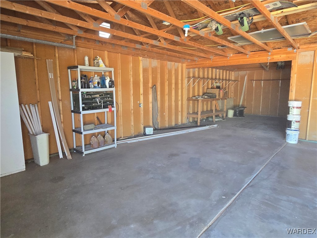4149 Carrizo Road Golden Valley, AZ 86413 - Photo 38 of 47 a view of an empty room with a garage