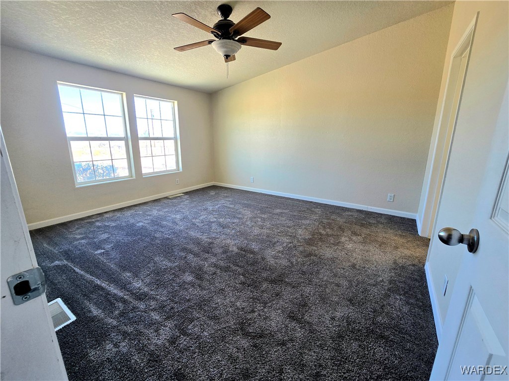 4149 Carrizo Road Golden Valley, AZ 86413 - Photo 8 of 47 a view of a livingroom with a window