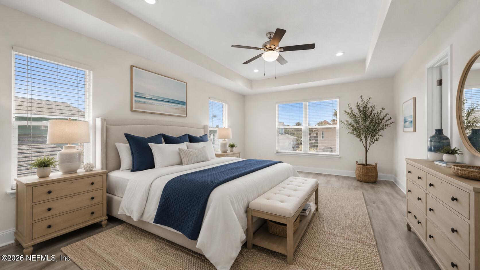 80 Seaside Capers Road St. Augustine, FL 32084 - Photo 31 of 47 a bed room with a bed and a chandelier