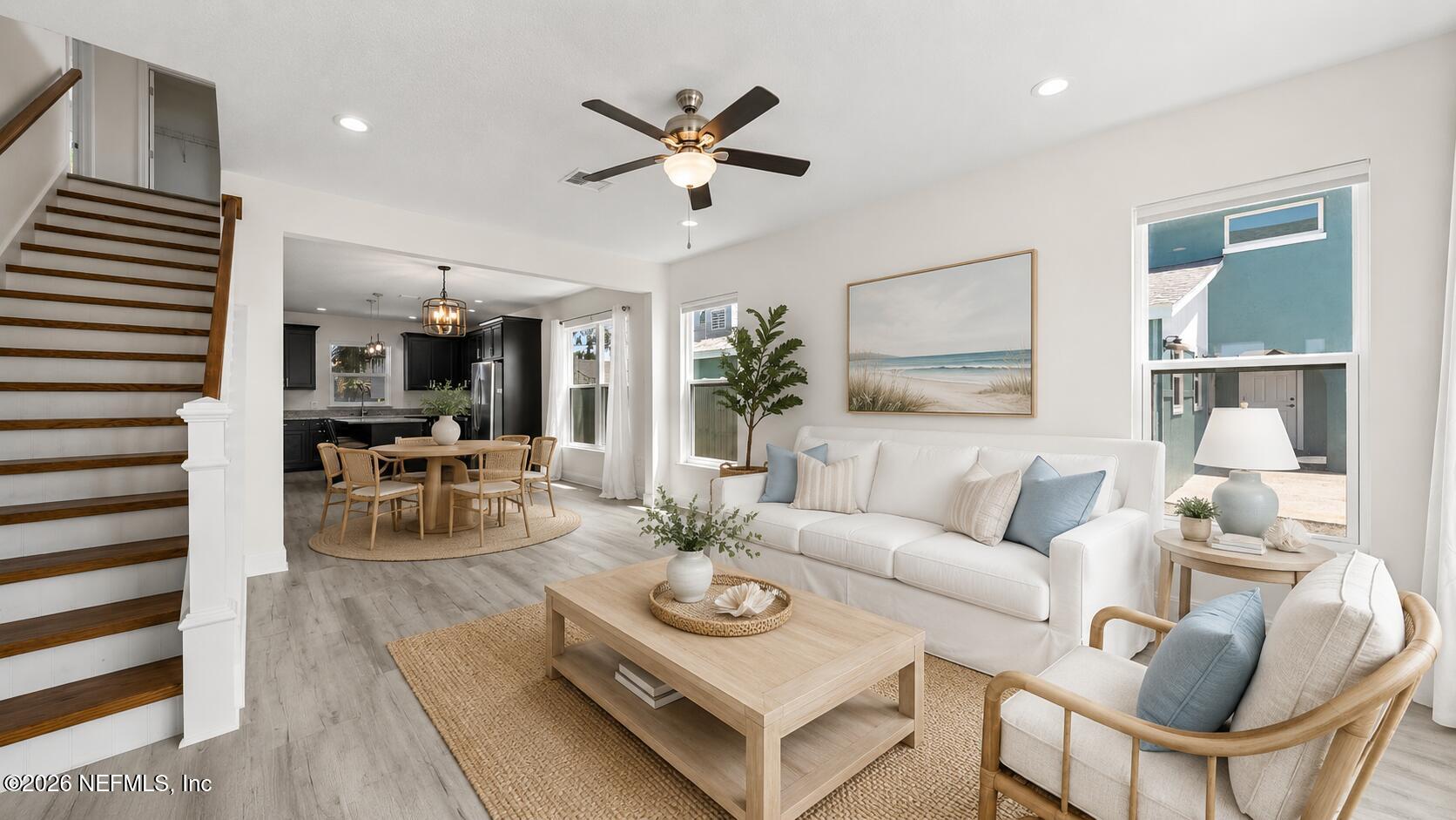 80 Seaside Capers Road St. Augustine, FL 32084 - Photo 6 of 47 a living room with furniture and a large window
