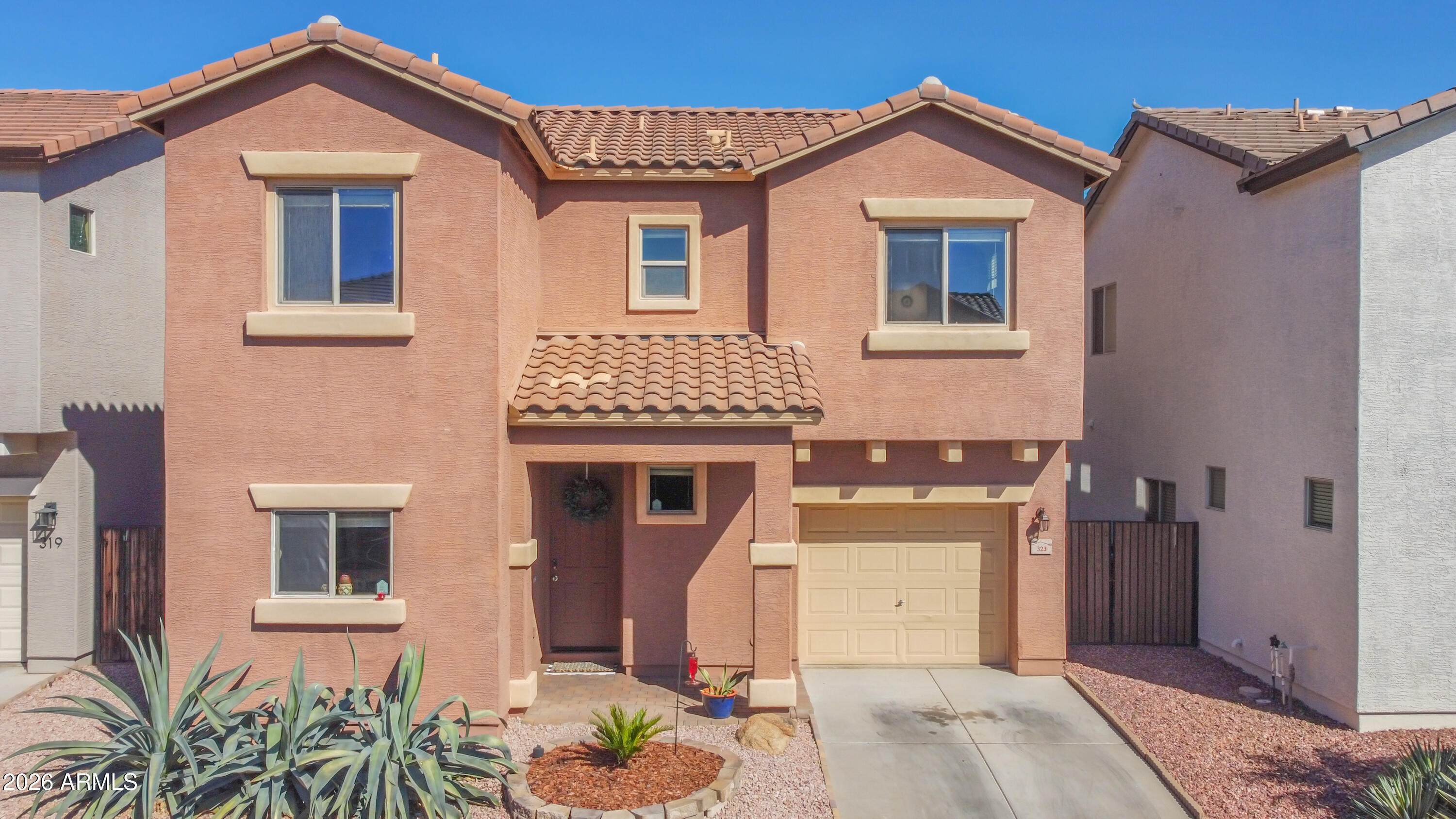 323 South Travis Mesa, AZ 85208 - Photo 1 of 30 a front view of a house with a yard