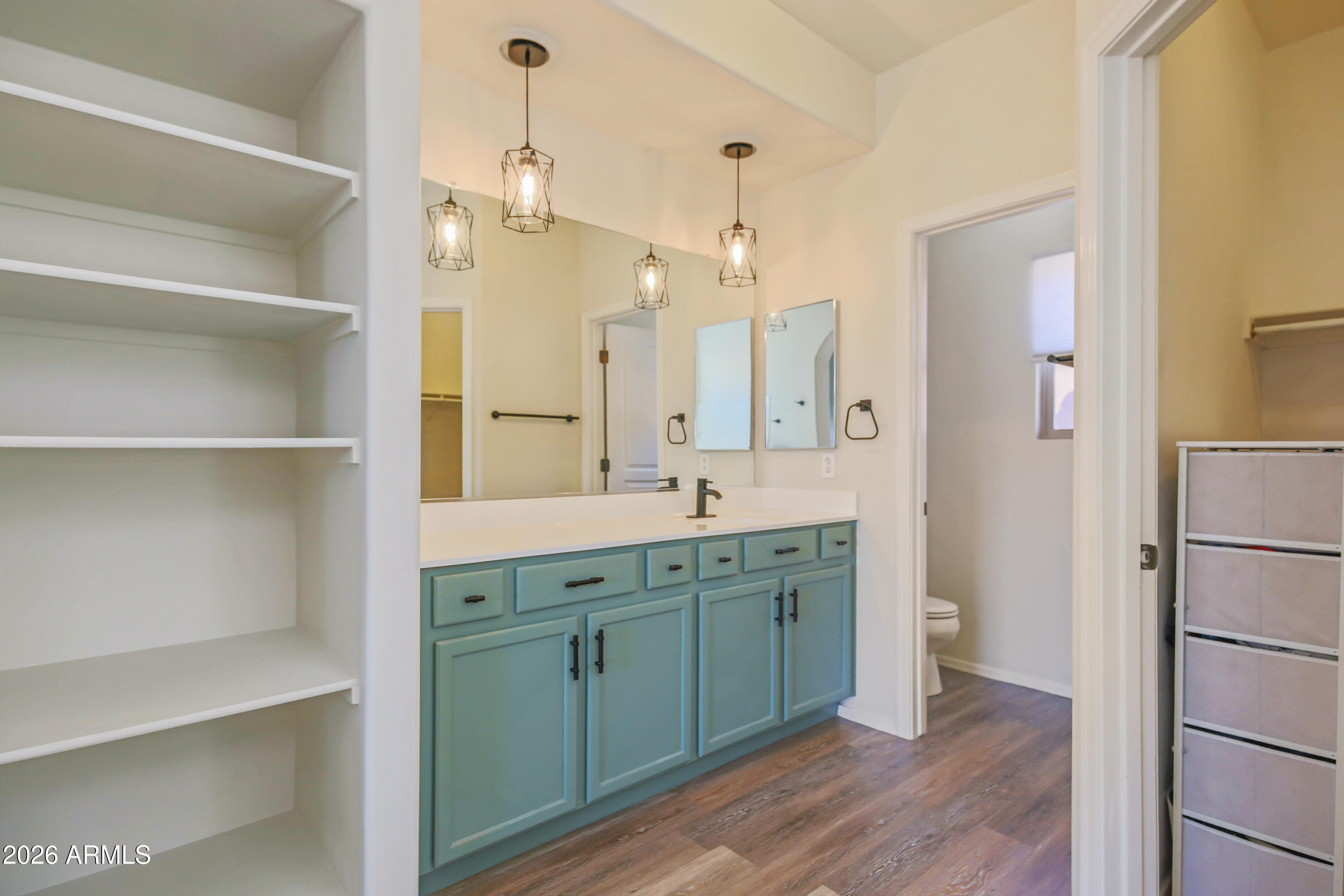 323 South Travis Mesa, AZ 85208 - Photo 14 of 30 a spacious bathroom with a double vanity sink a mirror and a shower