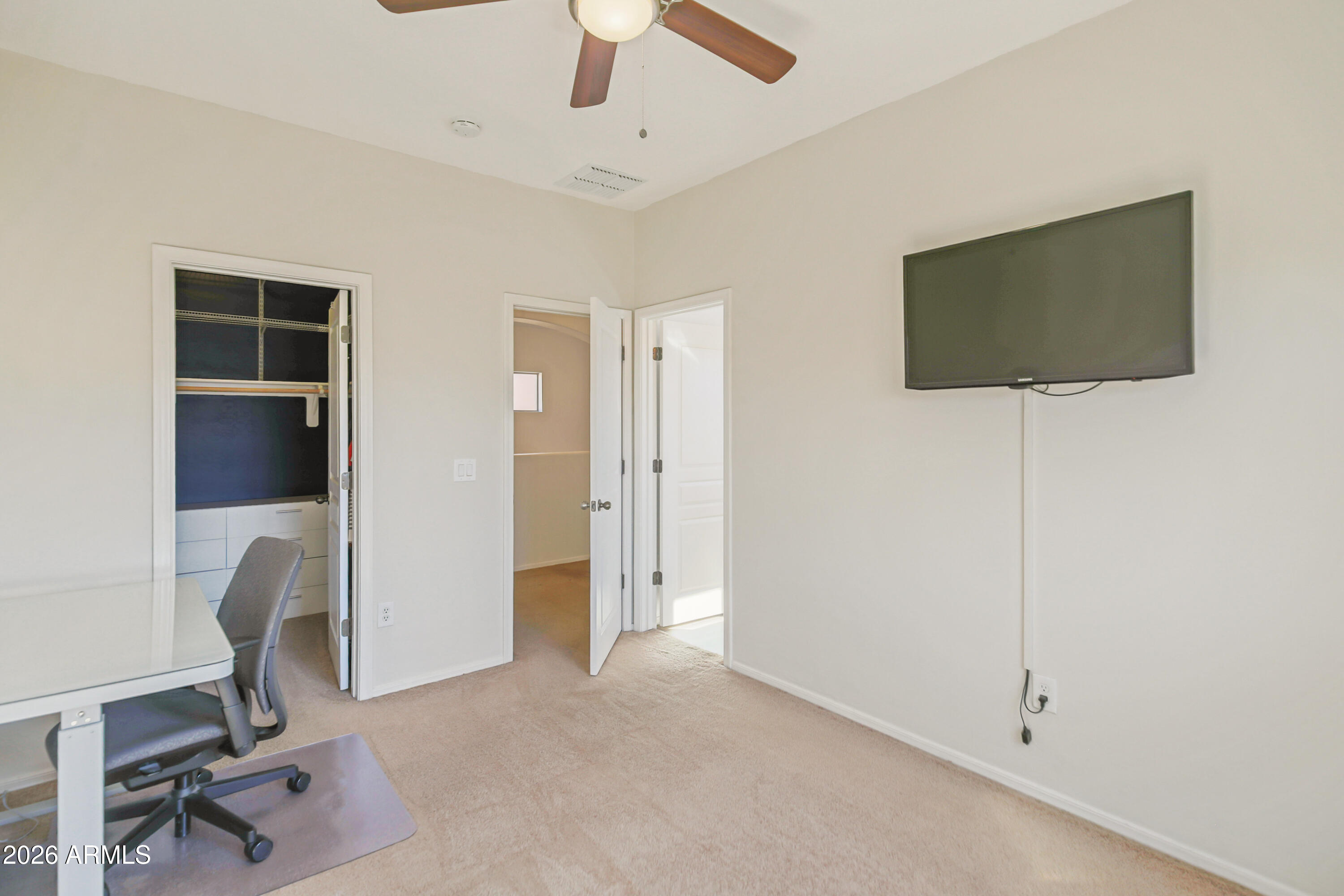 323 South Travis Mesa, AZ 85208 - Photo 18 of 30 a view of a livingroom with workspace and a window