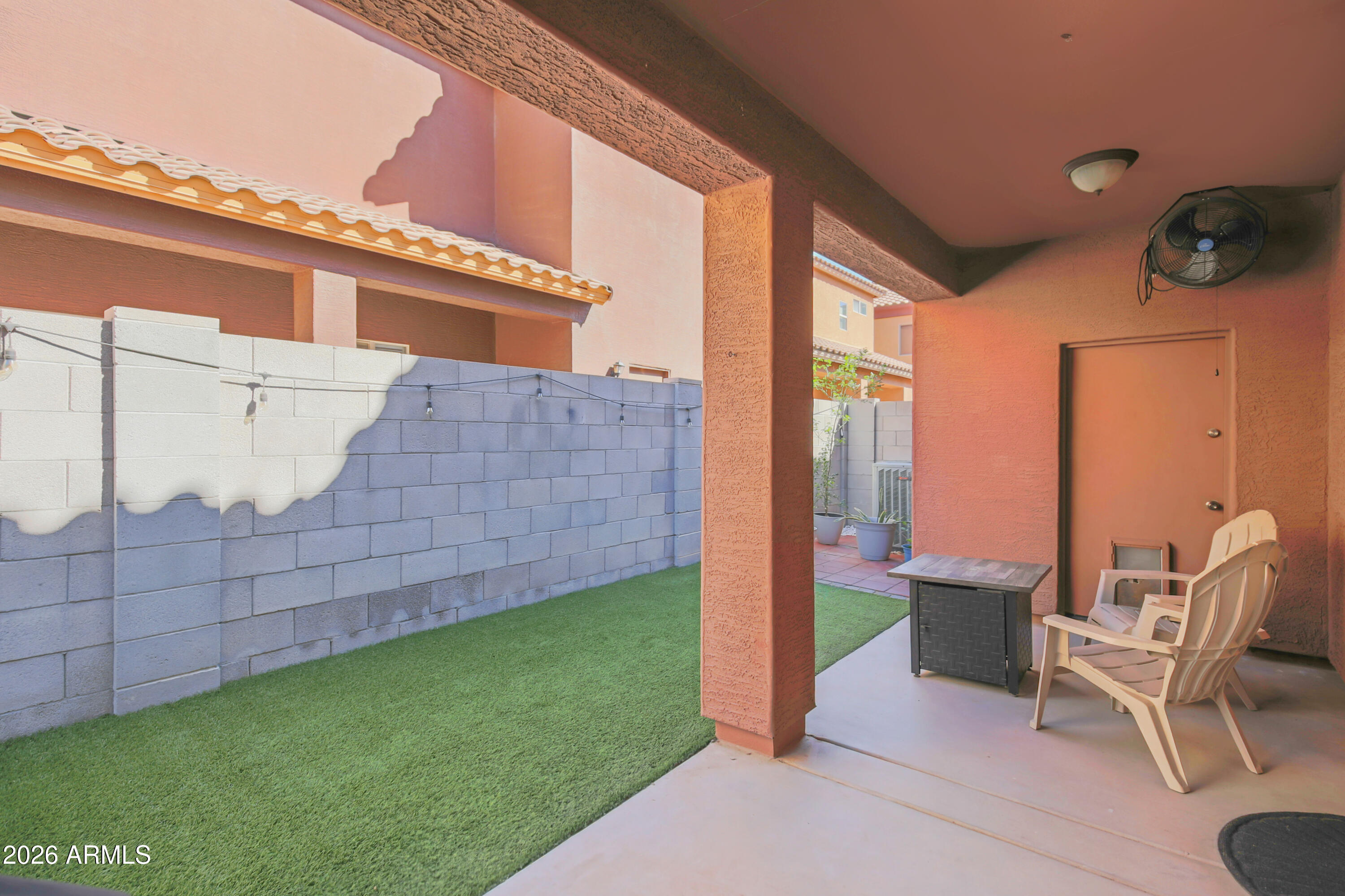 323 South Travis Mesa, AZ 85208 - Photo 23 of 30 a view of backyard with outdoor seating and plants