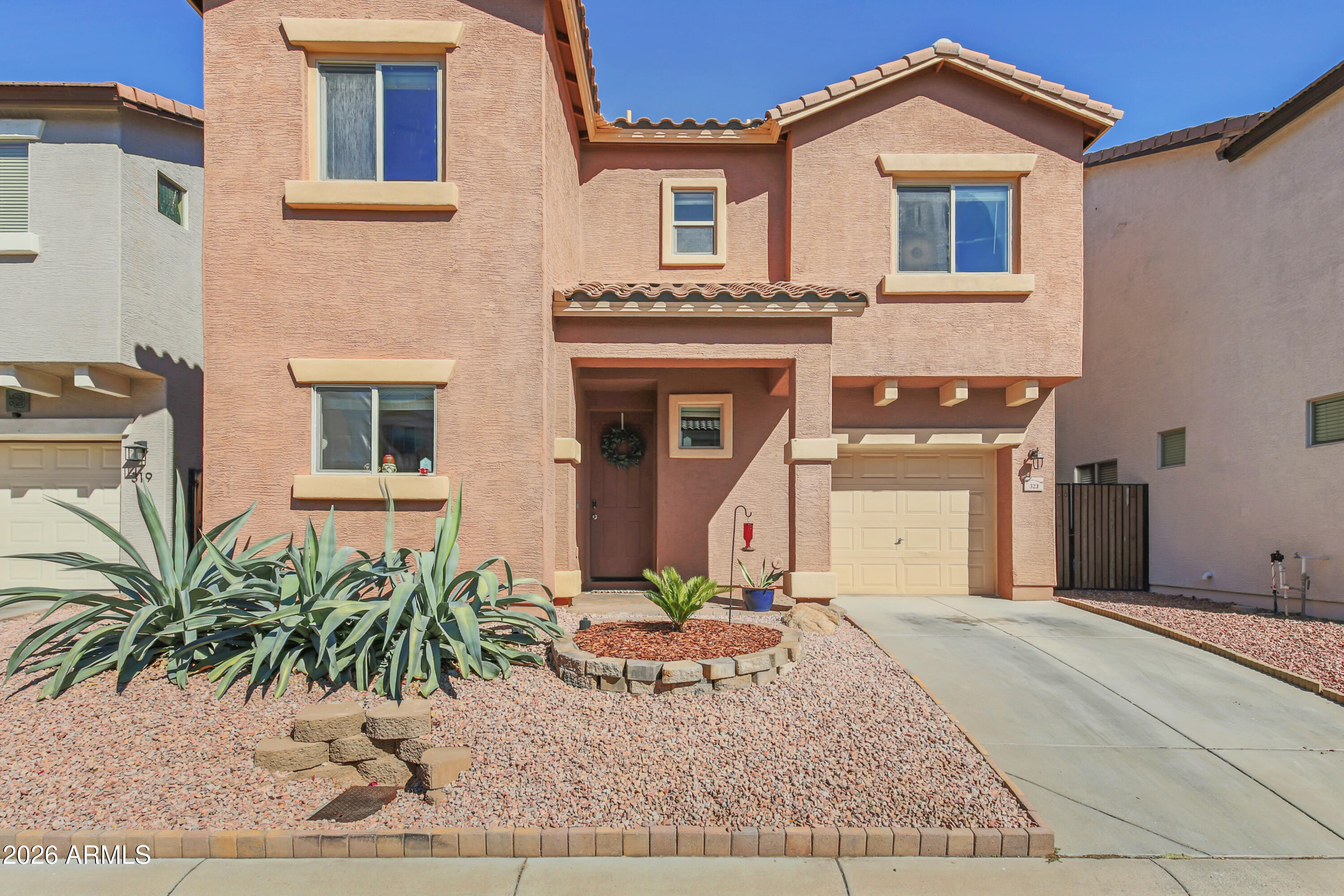 323 South Travis Mesa, AZ 85208 - Photo 26 of 30 front view of a house with a rug