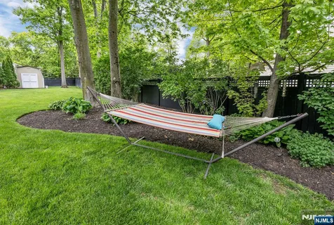 a garden view with a seating space