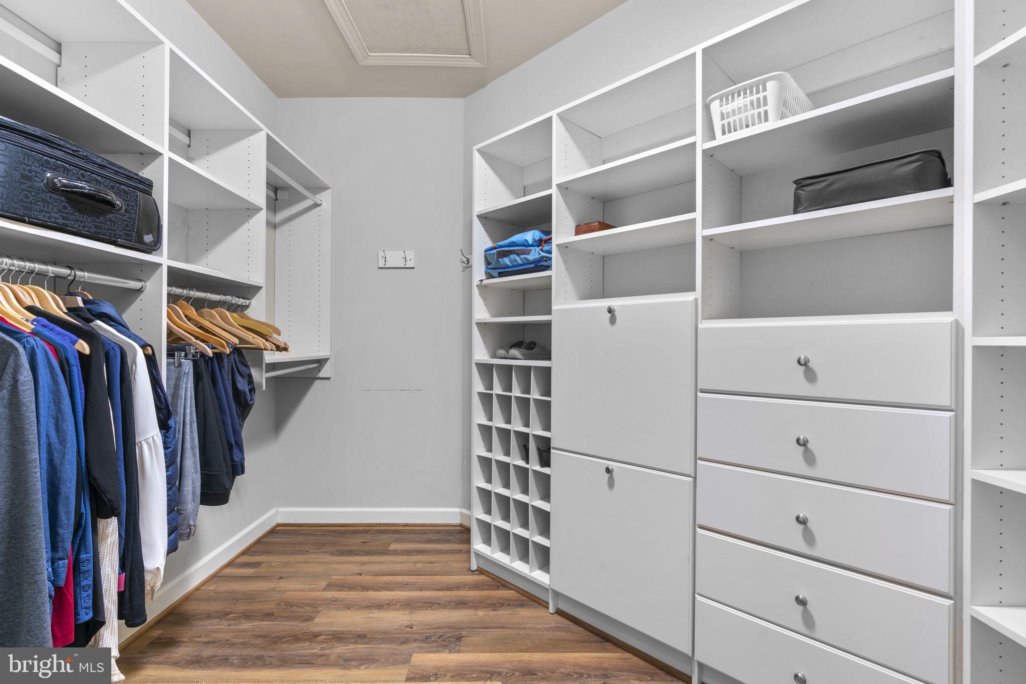 3091 Emerald Valley Road Ellicott City, MD 21042 - Photo 41 of 95 a view of walk in closet with clothes and shoes