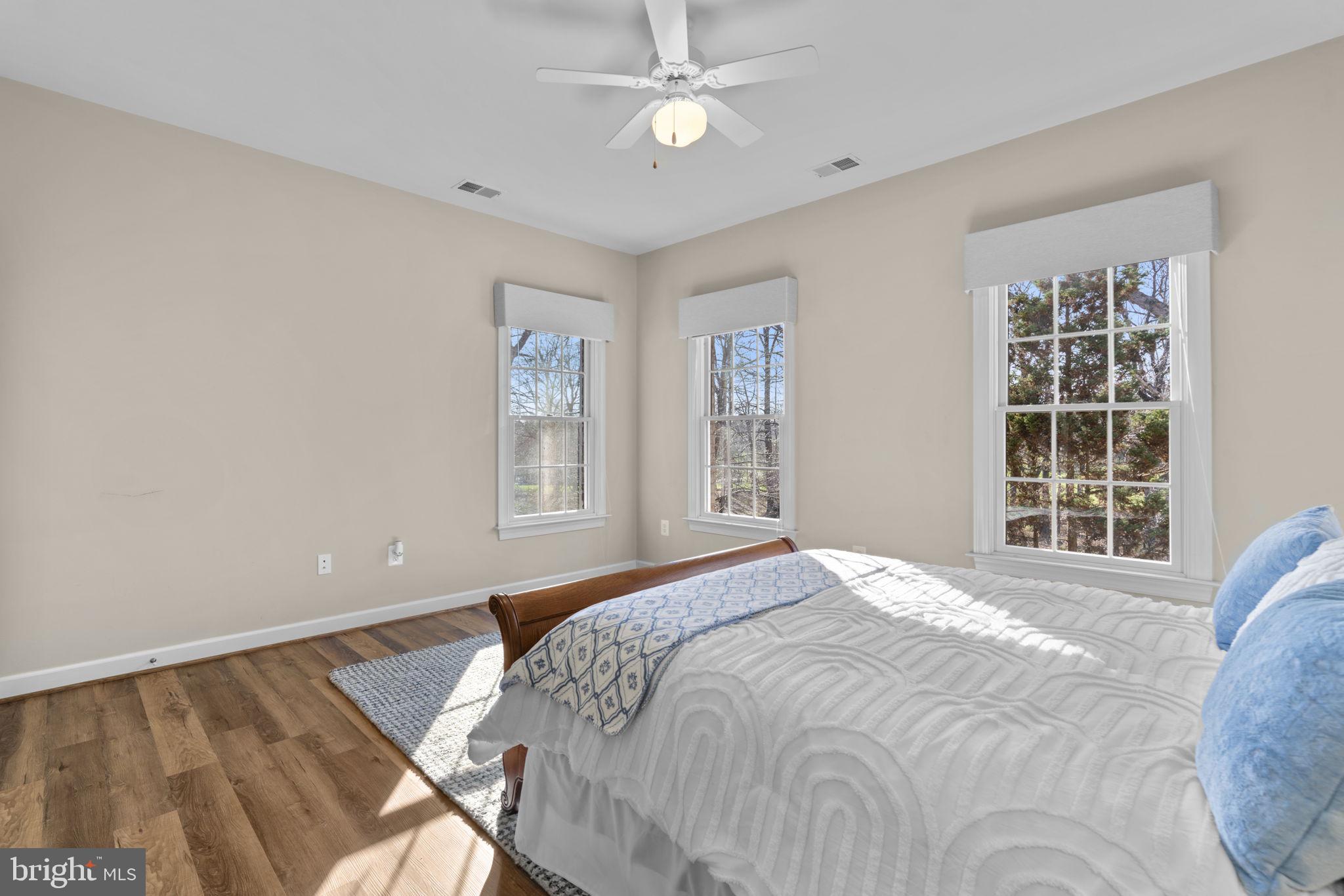 3091 Emerald Valley Road Ellicott City, MD 21042 - Photo 48 of 95 a bedroom with a bed and a window