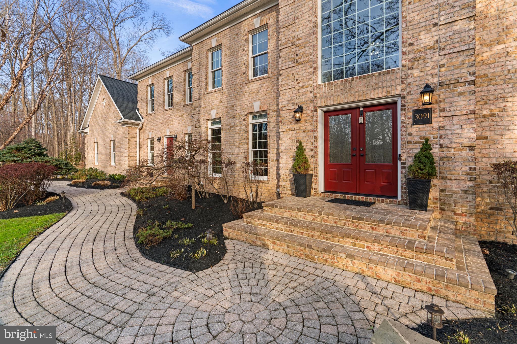 3091 Emerald Valley Road Ellicott City, MD 21042 - Photo 89 of 95 a view of a backyard with sitting area