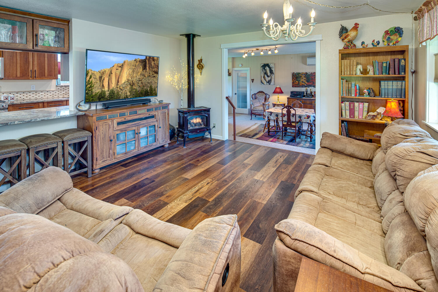 2218 Southwest 79th Street Redmond, OR 97756 - Photo 7 of 54 a living room with furniture and a flat screen tv