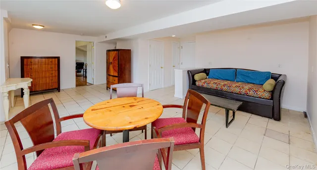 a view of work space with lounge chair