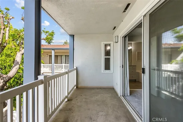 a view of a porch of a house