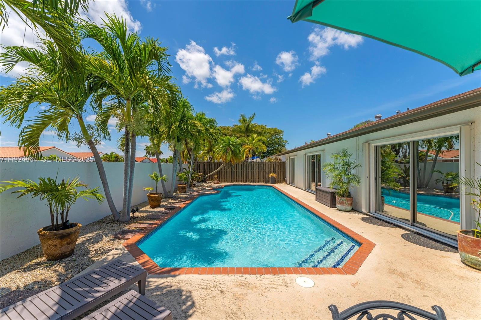 10020 Southwest 145th Place Miami, FL 33186 - Photo 13 of 35 a view of a backyard