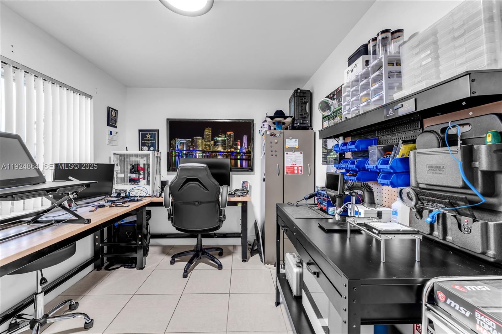 10020 Southwest 145th Place Miami, FL 33186 - Photo 24 of 35 a work room with furniture