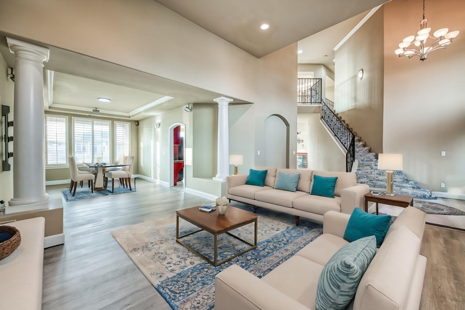 4679 North Island View Clovis, CA 93619 - Photo 11 of 55 a living room with furniture and wooden floor