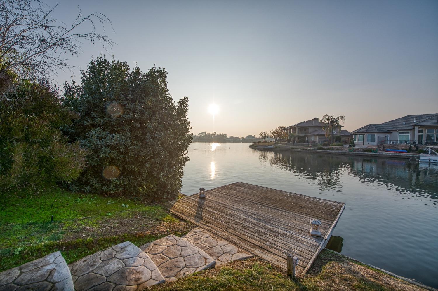 4679 North Island View Clovis, CA 93619 - Photo 35 of 55 a view of a lake with houses in the back