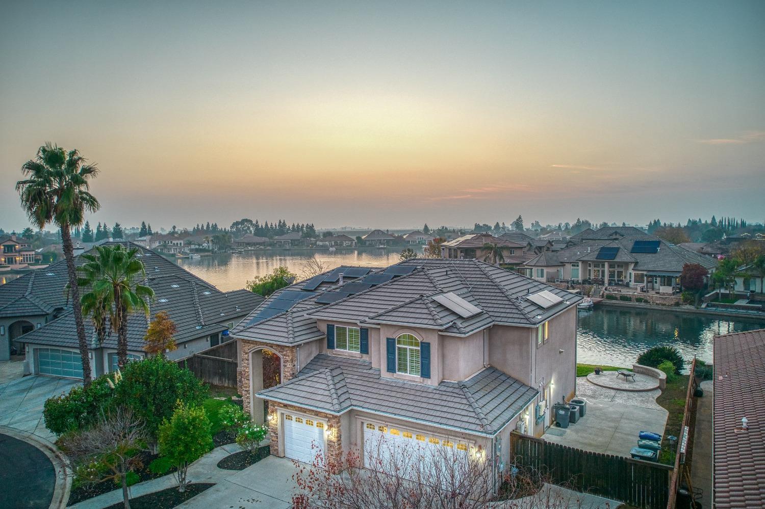 4679 North Island View Clovis, CA 93619 - Photo 41 of 55 an aerial view of residential houses with yard and ocean view