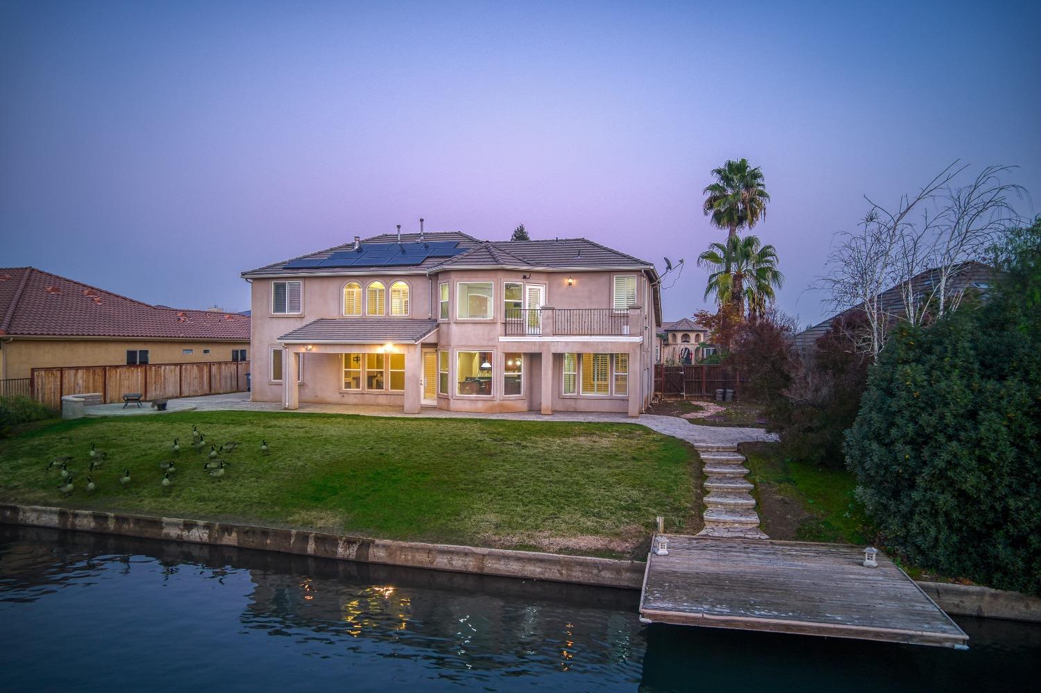 4679 North Island View Clovis, CA 93619 - Photo 50 of 55 a view of a house with a yard