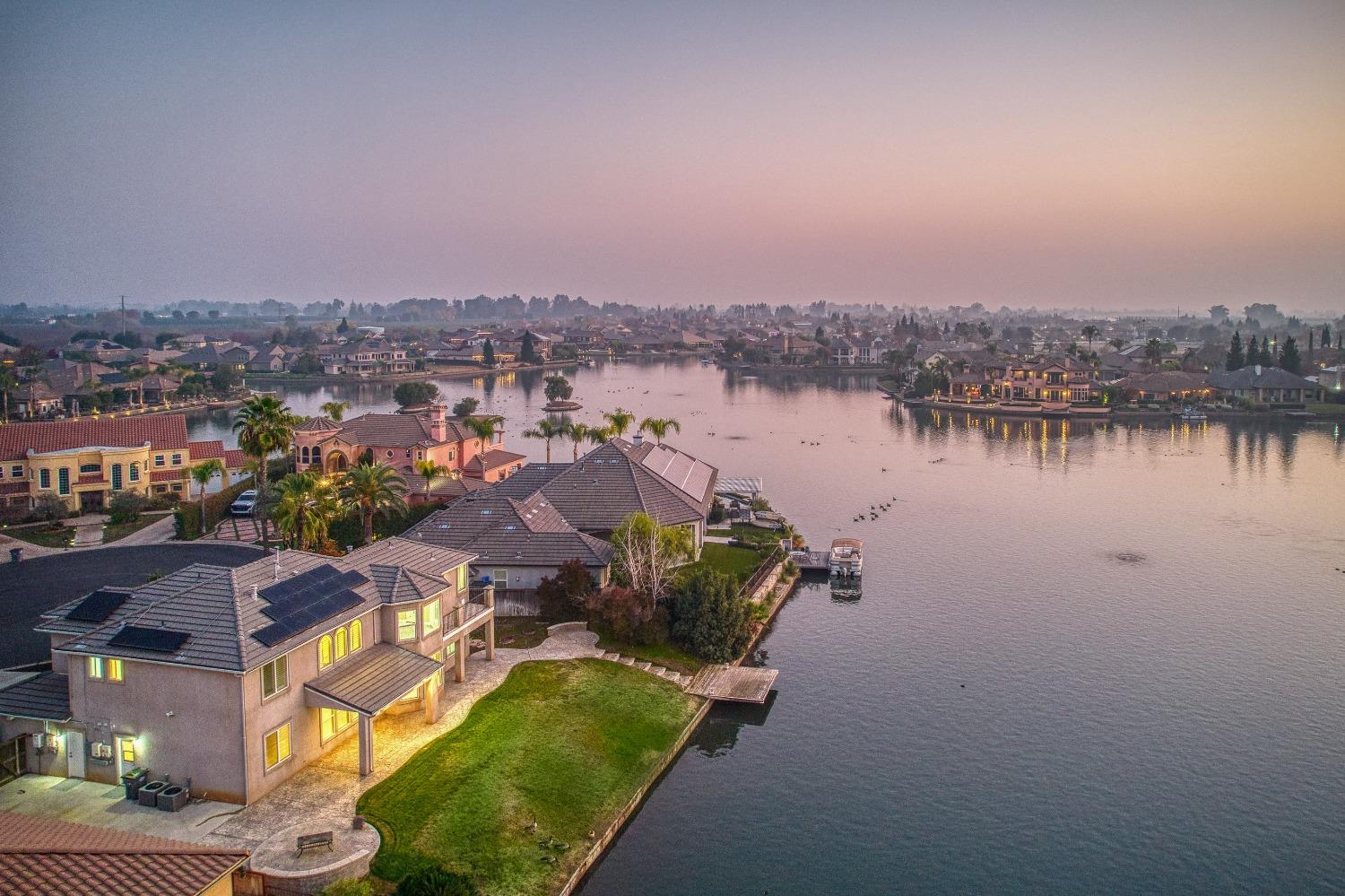 4679 North Island View Clovis, CA 93619 - Photo 53 of 55 an aerial view of a house with a lake view