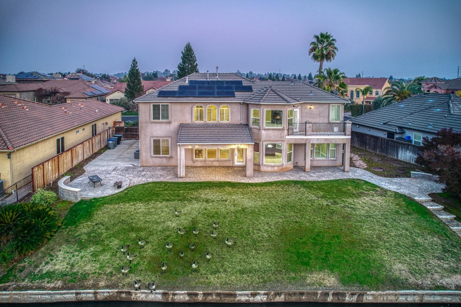 4679 North Island View Clovis, CA 93619 - Photo 55 of 55 front view of a house with a yard