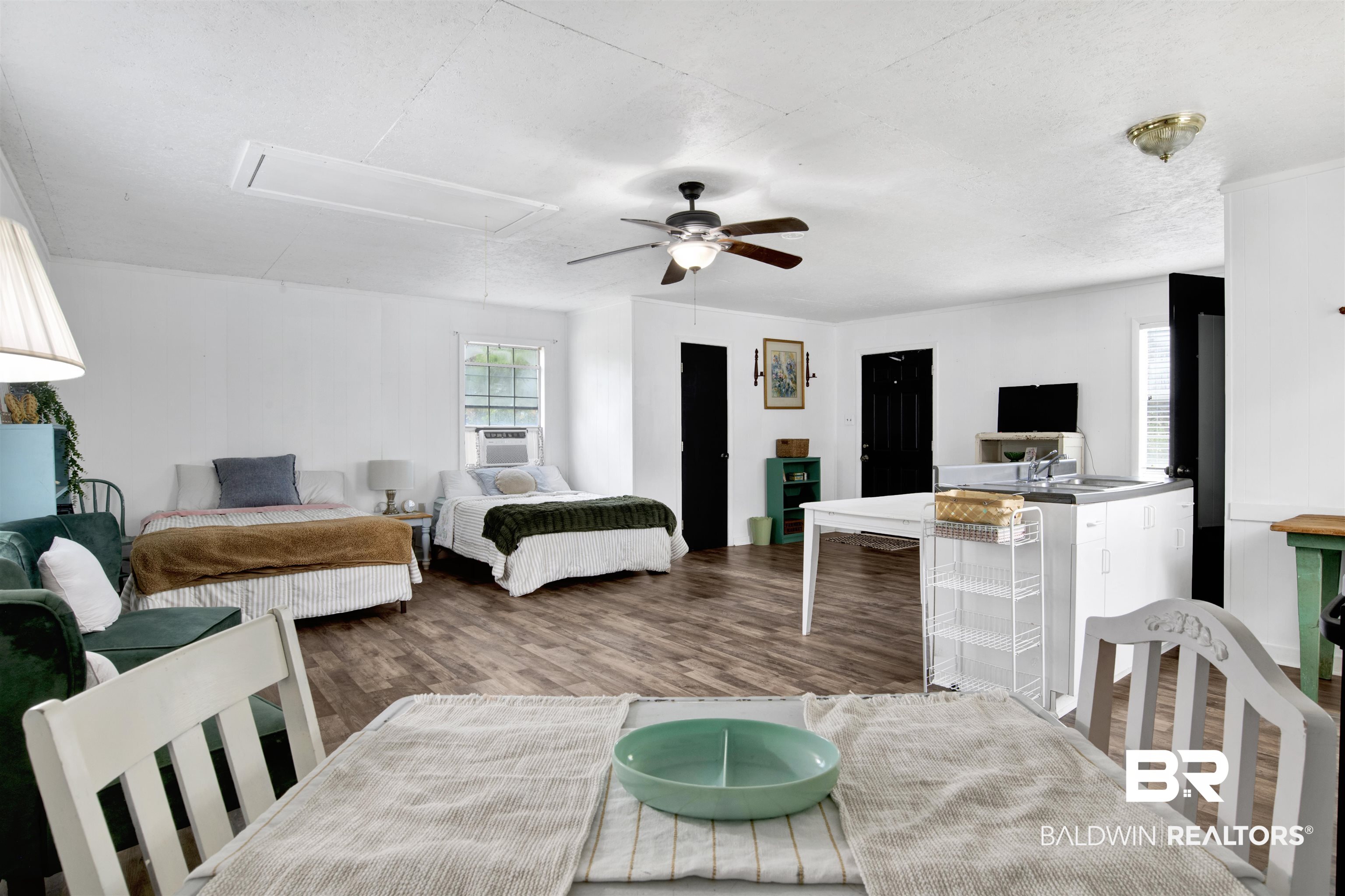 25700 Austin Road Daphne, AL 36526 - Photo 28 of 36 Bedroom featuring attic access, wood finished floors, and a ceiling fan