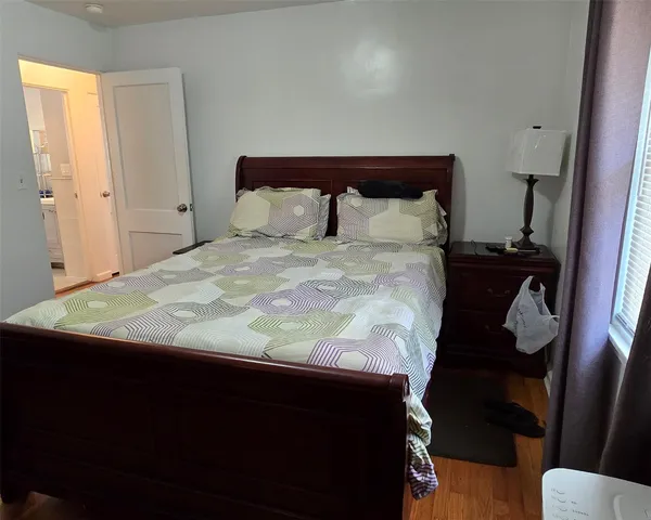 a bathroom with a toilet a sink and shower