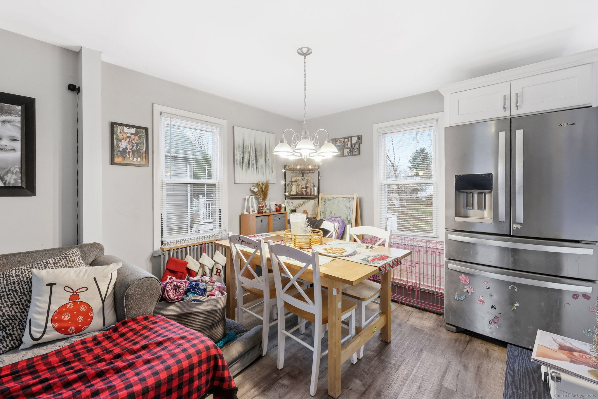 16 Brainard Road Enfield, CT 06082 - Photo 13 of 28 a view of a dining room with furniture window and wooden floor