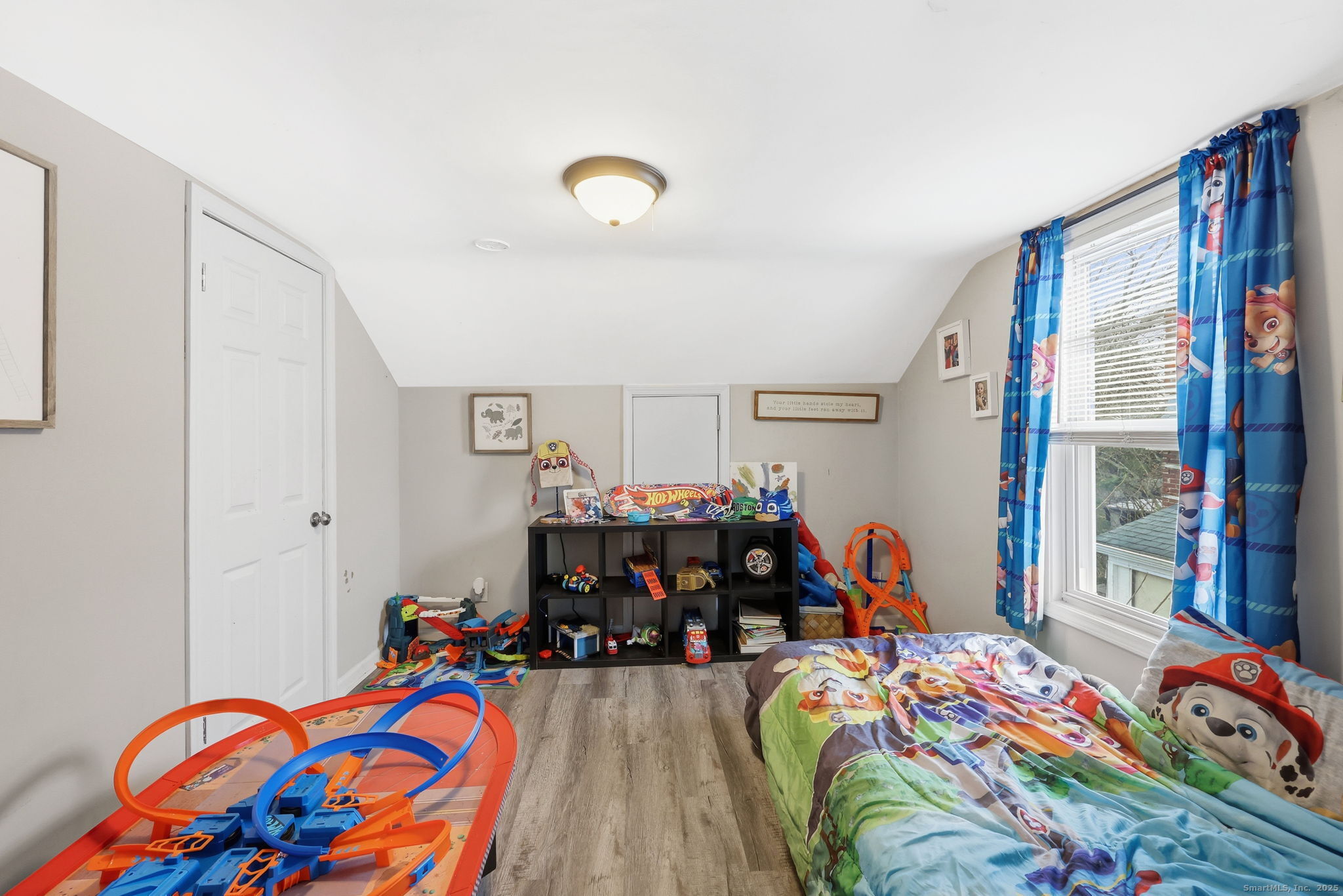 16 Brainard Road Enfield, CT 06082 - Photo 20 of 28 a bed room with a bed window and walk in closet