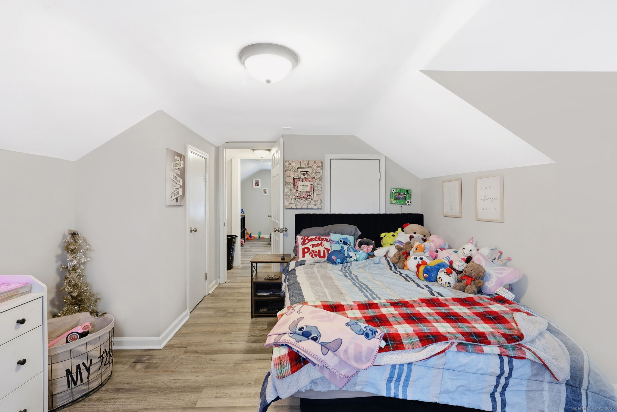 16 Brainard Road Enfield, CT 06082 - Photo 22 of 28 a bedroom with a bed and a couch